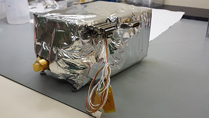 MicrOmega Flight Model covered by its MLI